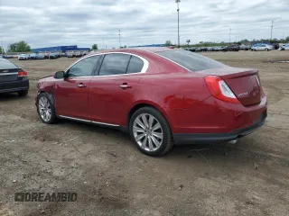 2013 Lincoln MKS EcoBoost with VIN 1LNHL9FT1DG604990, listed as a Copart auction lot 57619245 with 76,899 mi miles and Clean title. Bid and sale history available at DreamBid. Image 2.