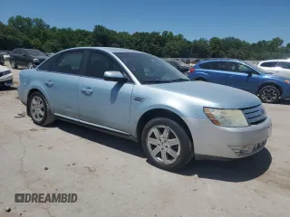 2008 Ford Taurus SEL z VIN 1FAHP24W78G119066, wystawiony jako Copart lot #57571895 z przebiegiem 231 039 mil mil oraz Tytuł czysty. Historia ofert i sprzedaży dostępna na DreamBid. Obrazek 4.