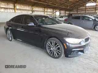2015 BMW 4 Series 428i with VIN WBA4A9C54FGL86784, listed as a Copart auction lot 64073315 with 73,337 mi miles and Salvage title. Bid and sale history available at DreamBid. Image 4.