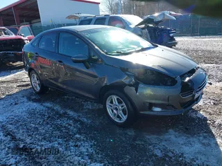 2019 Ford Fiesta SE z VIN 3FADP4BJ5KM111479, wystawiony jako IAAI lot #41833146 z przebiegiem 113 983 mil mil oraz . Historia ofert i sprzedaży dostępna na DreamBid. Obrazek 1.
