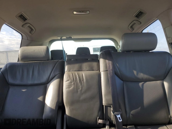 2009 Lexus LX 570 z VIN JTJHY00W394027647, wystawiony jako Copart lot #52262545 z przebiegiem 355 939 mil mil oraz Czysty tytuł • Clean title. Historia ofert i sprzedaży dostępna na DreamBid. Obrazek 10.