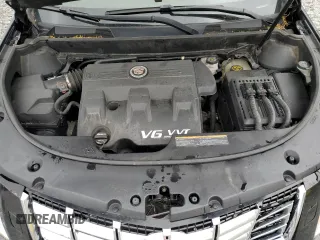 2014 Cadillac SRX Performance Collection with VIN 3GYFNFE33ES687941, listed as a Copart auction lot 57726675 with 164,059 mi miles and Clean title. Bid and sale history available at DreamBid. Image 12.