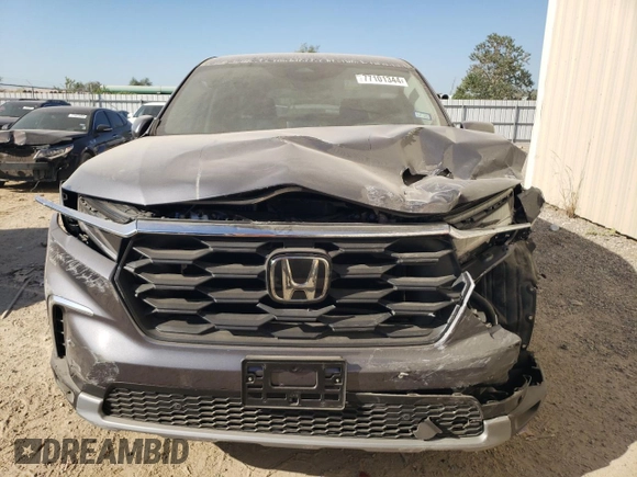 2024 Honda Pilot EX-L 7 Passenger with VIN 5FNYG2H58RB007819, listed as a Copart auction lot 77101344 with 2,829 mi miles and Salvage Title. Bid and sale history available at carsss.com. Image 5.