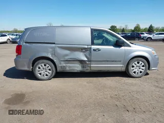 2014 Ram Cargo Van with VIN 2C4RRGAG9ER312915, listed as a IAAI auction lot 41947886 with 149,144 mi miles and . Bid and sale history available at DreamBid. Image 13.