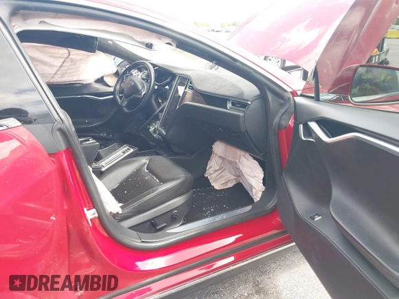 2016 Tesla Model S 70 with VIN 5YJSA1E16GF135833, listed as a IAAI auction lot 42084421 with 97,615 mi miles and . Bid and sale history available at DreamBid. Image 5.