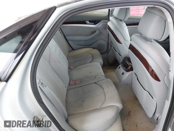 2013 Audi A8 4.0L с VIN WAUA2AFD5DN017770, выставлен на аукционе IAAI как лот 41255625 с пробегом 115 993 миль миль и . История ставок и продаж доступна на DreamBid. Изображение 8.
