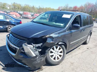 2014 Chrysler Town & Country Touring with VIN 2C4RC1BG1ER453328, listed as a IAAI auction lot 42135021 with 138,443 mi miles. Bid and sale history available at carsss.com. Image 2.