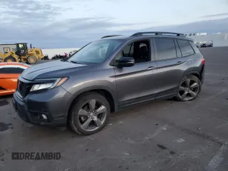 2021 Honda Passport Touring with VIN 5FNYF8H93MB006966, listed as a Copart auction lot 84738884 with 48,467 mi miles and Salvage Title. Bid and sale history available at carsss.com. Image 1.