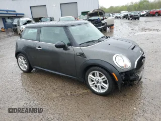 2013 MINI Hardtop S with VIN WMWSV3C50DT477984, listed as a Copart auction lot 56190855 with 98,878 mi miles and Salvage Title. Bid and sale history available at DreamBid. Image 4.