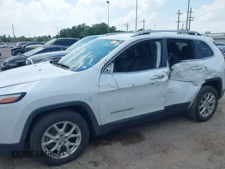 2018 Jeep Cherokee Latitude Plus with VIN 1C4PJLLBXJD590695, listed as a IAAI auction lot 39653845 with 76,667 mi miles and . Bid and sale history available at DreamBid. Image 14.