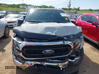 2023 Ford F-150 XL with VIN 1FTMF1C53PKF34184, listed as a IAAI auction lot 42242703 with 27,312 mi miles and . Bid and sale history available at DreamBid. Image 13.