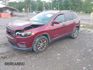 2019 Jeep Cherokee Latitude Plus with VIN 1C4PJMLB3KD195412, listed as a IAAI auction lot 42117860 with 177,178 mi miles. Bid and sale history available at carsss.com. Image 2.