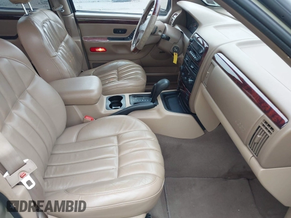 2000 Jeep Grand Cherokee Limited with VIN 1J4GW58S8YC361416, listed as a IAAI auction lot 42342095 with 138,100 mi miles and . Bid and sale history available at DreamBid. Image 5.