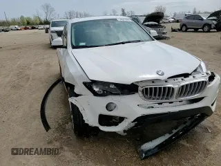 2016 BMW X4 xDrive28i with VIN 5UXXW3C52G0M90018, listed as a Copart auction lot 54887645 with 76,633 mi miles and Salvage title. Bid and sale history available at DreamBid. Image 13.