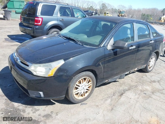 2009 Ford Focus SE with VIN 1FAHP35N09W158407, listed as a IAAI auction lot 41867919 with 174,901 mi miles. Bid and sale history available at carsss.com. Image 2.