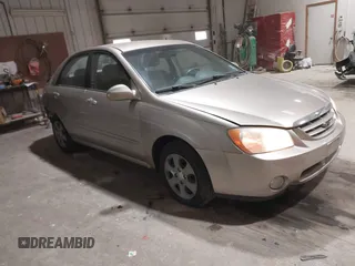 2005 Kia Spectra LX with VIN KNAFE121555081432, listed as a IAAI auction lot 41485992 with 98,604 mi miles. Bid and sale history available at carsss.com. Image 1.