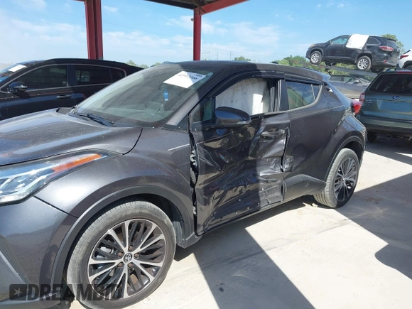 2021 Toyota C-HR LE with VIN NMTKHMBX4MR120064, listed as a IAAI auction lot 41912166 with 61,402 mi miles and . Bid and sale history available at DreamBid. Image 6.