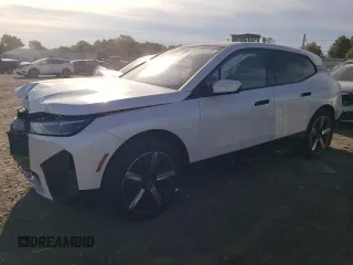 2023 BMW iX xDrive50 z VIN WB523CF07PCM92331, wystawiony jako Copart lot #64938133 z przebiegiem Nie podano mil oraz . Historia ofert i sprzedaży dostępna na DreamBid. Obrazek 1.