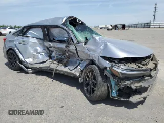 2022 Honda Civic Sport z VIN 2HGFE2F54NH515517, wystawiony jako Copart lot #54695585 z przebiegiem Nie podano mil oraz Szkoda całkowita • Salvage title. Historia ofert i sprzedaży dostępna na DreamBid. Obrazek 4.