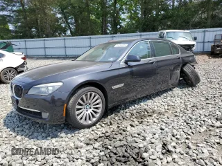 2012 BMW 7 Series 750Li xDrive with VIN WBAKC8C55CC435327, listed as a Copart auction lot 59285095 with 122,409 mi miles and Salvage title. Bid and sale history available at DreamBid. Image 1.