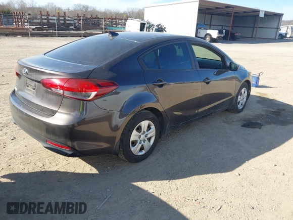 2018 Kia Forte LX with VIN 3KPFL4A76JE217369, listed as a IAAI auction lot 41673754 with 100,545 mi miles. Bid and sale history available at carsss.com. Image 4.