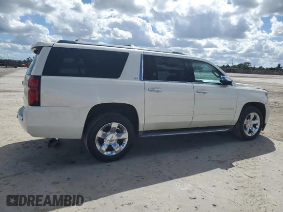2015 Chevrolet Suburban LTZ with VIN 1GNSKKKC0FR130023, listed as a Copart auction lot 46630825 with 140,057 mi miles and Salvage Title. Bid and sale history available at carsss.com. Image 3.