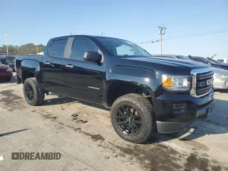 2018 GMC Canyon 2WD with VIN 1GTG5BEN8J1277765, listed as a Copart auction lot 74299244 with 57,042 mi miles and Salvage Title. Bid and sale history available at carsss.com. Image 4.