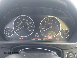 2014 BMW 4 Series 428i xDrive with VIN WBA3N9C57EK245350, listed as a IAAI auction lot 42184111 with 127,908 mi miles and . Bid and sale history available at DreamBid. Image 7.