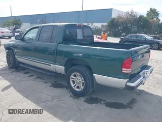 2001 Dodge Dakota Sport with VIN 1B7HL2AN81S281275, listed as a IAAI auction lot 41693105 with 276,182 mi miles. Bid and sale history available at carsss.com. Image 3.