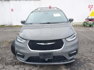 2021 Chrysler Pacifica Touring L with VIN 2C4RC1BG0MR543634, listed as a IAAI auction lot 41513467 with 148,010 mi miles and . Bid and sale history available at DreamBid. Image 12.