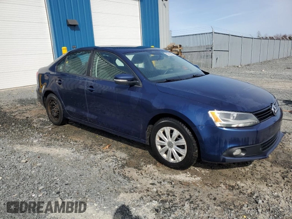 2014 Volkswagen Jetta Comfortline z VIN 3VWDL7AJ8EM280289, wystawiony jako Copart lot #55319845 z przebiegiem 190 558 mil mil oraz Czysty tytuł • Clean title. Historia ofert i sprzedaży dostępna na DreamBid. Obrazek 4.