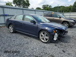 2014 Volkswagen Passat SE with VIN 1VWBT7A36EC095006, listed as a Copart auction lot 63029305 with Not provided miles and Salvage title. Bid and sale history available at DreamBid. Image 4.