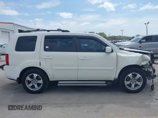 2014 Honda Pilot EX-L with VIN 5FNYF4H52EB055549, listed as a IAAI auction lot 42086456 with 292,594 mi miles and . Bid and sale history available at carsss.com. Image 14.