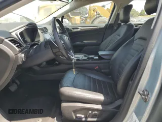 2013 Ford Fusion SE Hybrid with VIN 3FA6P0LU9DR281697, listed as a Copart auction lot 58583675 with 136,121 mi miles and Salvage title. Bid and sale history available at DreamBid. Image 7.