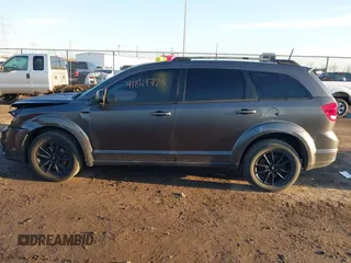 2019 Dodge Journey SE with VIN 3C4PDCBB2KT873970, listed as a IAAI auction lot 41864725 with 91,240 mi miles and . Bid and sale history available at DreamBid. Image 14.