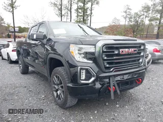 2022 GMC Sierra 1500 AT4 with VIN 1GTU9EET8NZ176059, listed as a IAAI auction lot 41250922 with 28,528 mi miles. Bid and sale history available at carsss.com. Image 1.