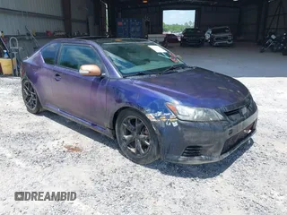 2011 Scion tC with VIN JTKJF5C74B3013322, listed as a IAAI auction lot 41929471 with 214,043 mi miles. Bid and sale history available at carsss.com. Image 1.