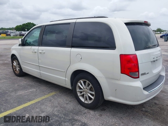 2014 Dodge Grand Caravan SXT z VIN 2C4RDGCGXER322705, wystawiony jako IAAI lot #42450791 z przebiegiem 147 113 mil mil oraz . Historia ofert i sprzedaży dostępna na DreamBid. Obrazek 3.