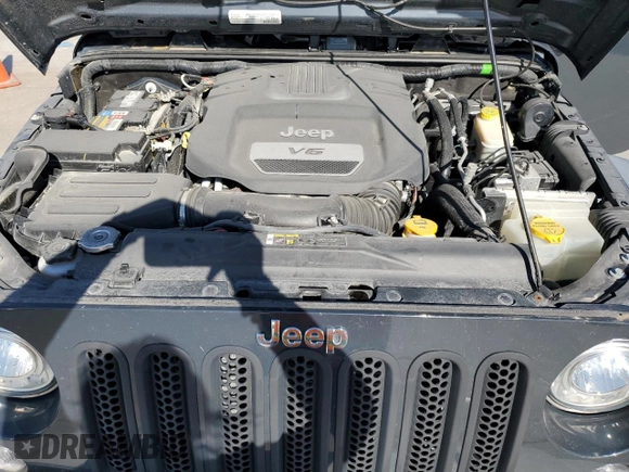 2017 Jeep Wrangler Unlimited Sport with VIN 1C4BJWDG7HL607071, listed as a Copart auction lot 88985355 with 123,795 mi miles and Salvage title. Bid and sale history available at DreamBid. Image 12.