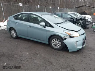 2014 Toyota Prius Plug-In with VIN JTDKN3DP7E3050161, listed as a IAAI auction lot 41448175 with 136,461 mi miles. Bid and sale history available at carsss.com. Image 1.