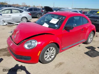 2016 Volkswagen Beetle Coupe 1.8T Wolfsburg Edition with VIN 3VWF17AT7GM608322, listed as a IAAI auction lot 41395323 with 112,054 mi miles. Bid and sale history available at carsss.com. Image 17.