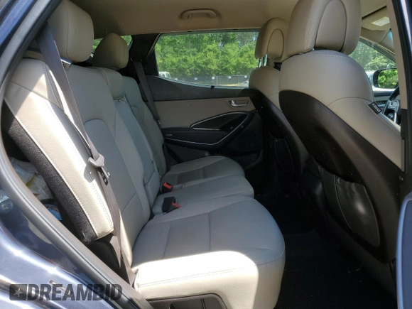 2017 Hyundai Santa Fe 2.4L z VIN 5NMZUDLB7HH028678, wystawiony jako Copart lot #57557855 z przebiegiem 102 049 mil mil oraz Szkoda całkowita • Salvage title. Historia ofert i sprzedaży dostępna na DreamBid. Obrazek 11.