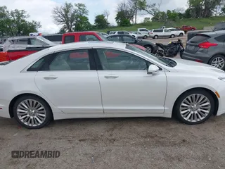 2016 Lincoln MKZ with VIN 3LN6L2J91GR620212, listed as a IAAI auction lot 42339396 with 90,195 mi miles and . Bid and sale history available at DreamBid. Image 13.