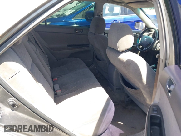 2005 Toyota Camry STD z VIN 4T1BE32K95U556765, wystawiony jako IAAI lot #42288424 z przebiegiem 232 413 mil mil oraz . Historia ofert i sprzedaży dostępna na DreamBid. Obrazek 8.