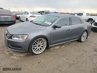 2014 Volkswagen Passat SE w/Sunroof with VIN 1VWBS7A31EC070887, listed as a Copart auction lot 46997125 with 127,523 mi miles and Clean Title. Bid and sale history available at carsss.com. Image 1.