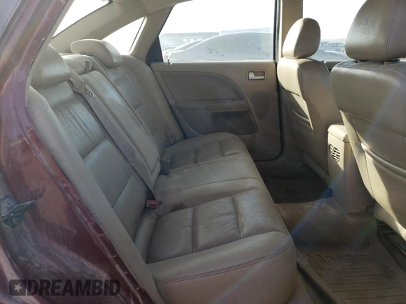 2005 Ford Five Hundred Limited with VIN 1FAFP28105G189607, listed as a Copart auction lot 76132644 with 164,154 mi miles and Clean Title. Bid and sale history available at carsss.com. Image 10.