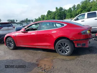 2020 Tesla Model S Long Range with VIN 5YJSA1E25LF396213, listed as a IAAI auction lot 42383231 with 73,125 mi miles and . Bid and sale history available at DreamBid. Image 14.