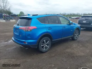 2017 Toyota RAV4 XLE with VIN JTMRFREV4HJ123496, listed as a IAAI auction lot 42068817 with 211,682 mi miles. Bid and sale history available at carsss.com. Image 4.