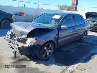 2005 Mitsubishi Lancer ES with VIN JA3AJ26E25U017526, listed as a IAAI auction lot 41680488 with 166,175 mi miles. Bid and sale history available at carsss.com. Image 2.