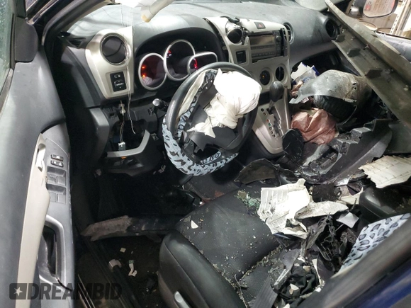 2009 Toyota Matrix with VIN 2T1KU40E89C089965, listed as a Copart auction lot 43244975 with 216,931 mi miles and Salvage Title. Bid and sale history available at DreamBid. Image 8.